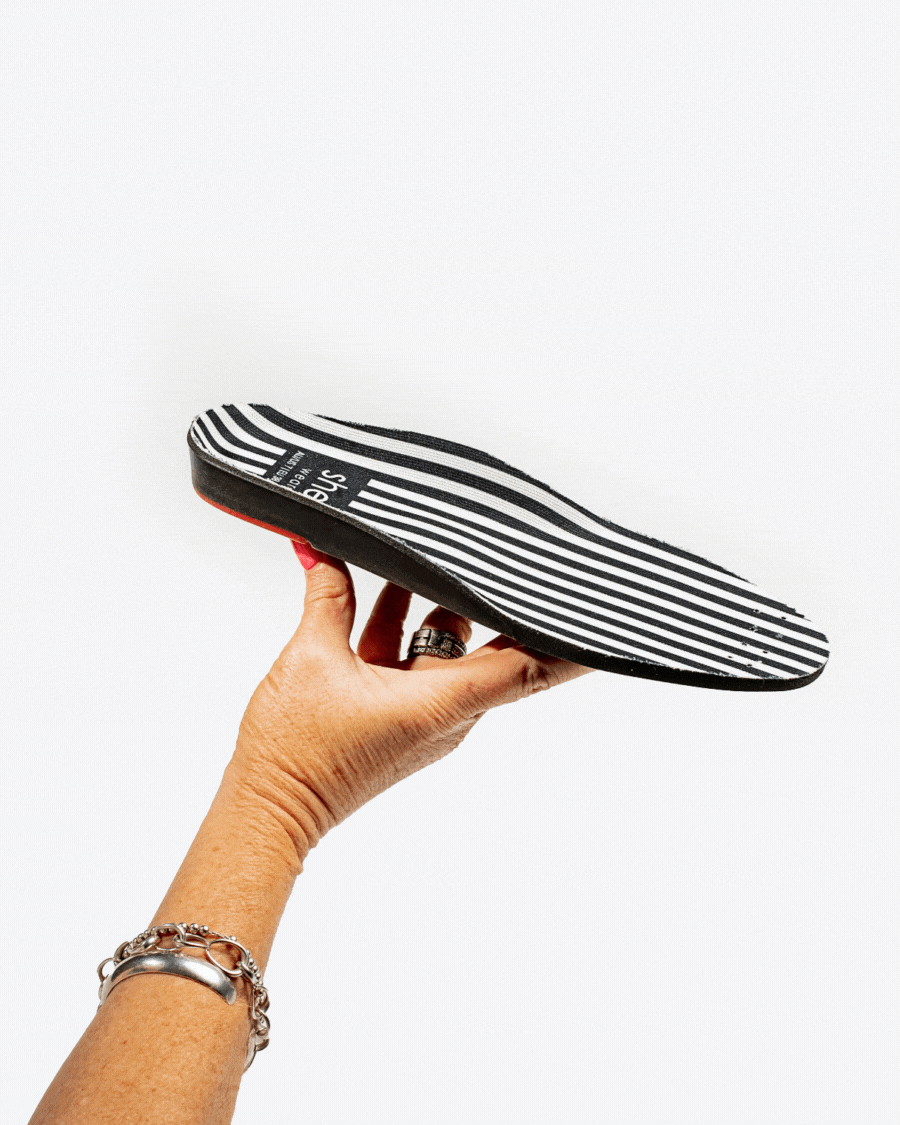 Signature striped black and white footbed with built in support.