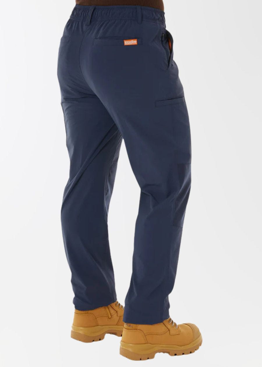 Rear view of a woman wearing navy work pants, showing straight leg cut and abundant pockets