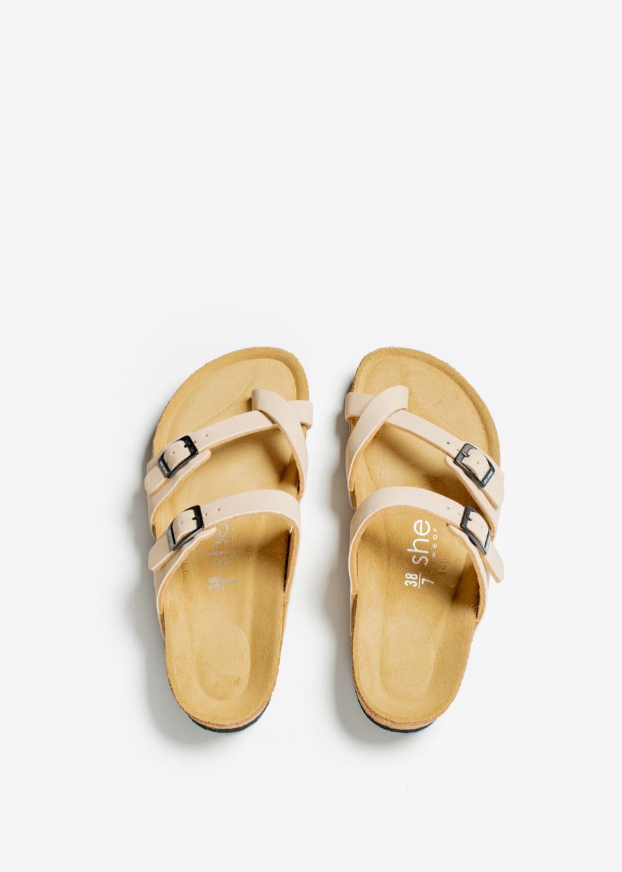 A pair of slides with adjustable length straps