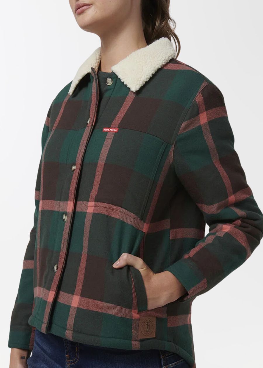 woman wearing a green chequered jacket