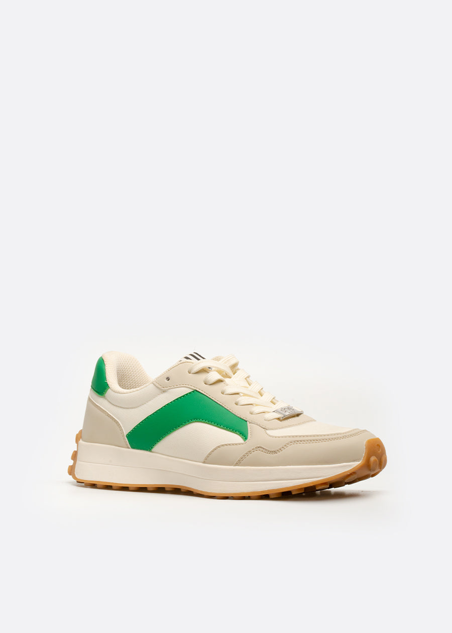 A white faux leather sneaker with green side stripe