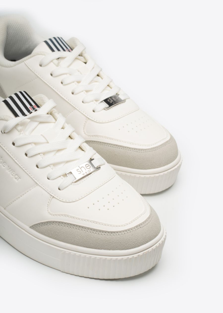 Rise women's fashion sneaker with an elevated platform sole