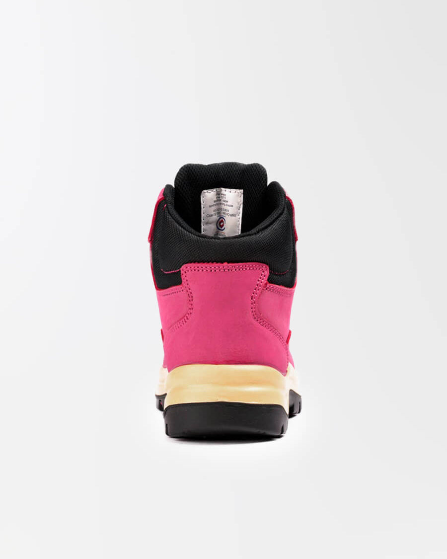 The back heel of a pink safety boot, showing the black outsole and tan midsole