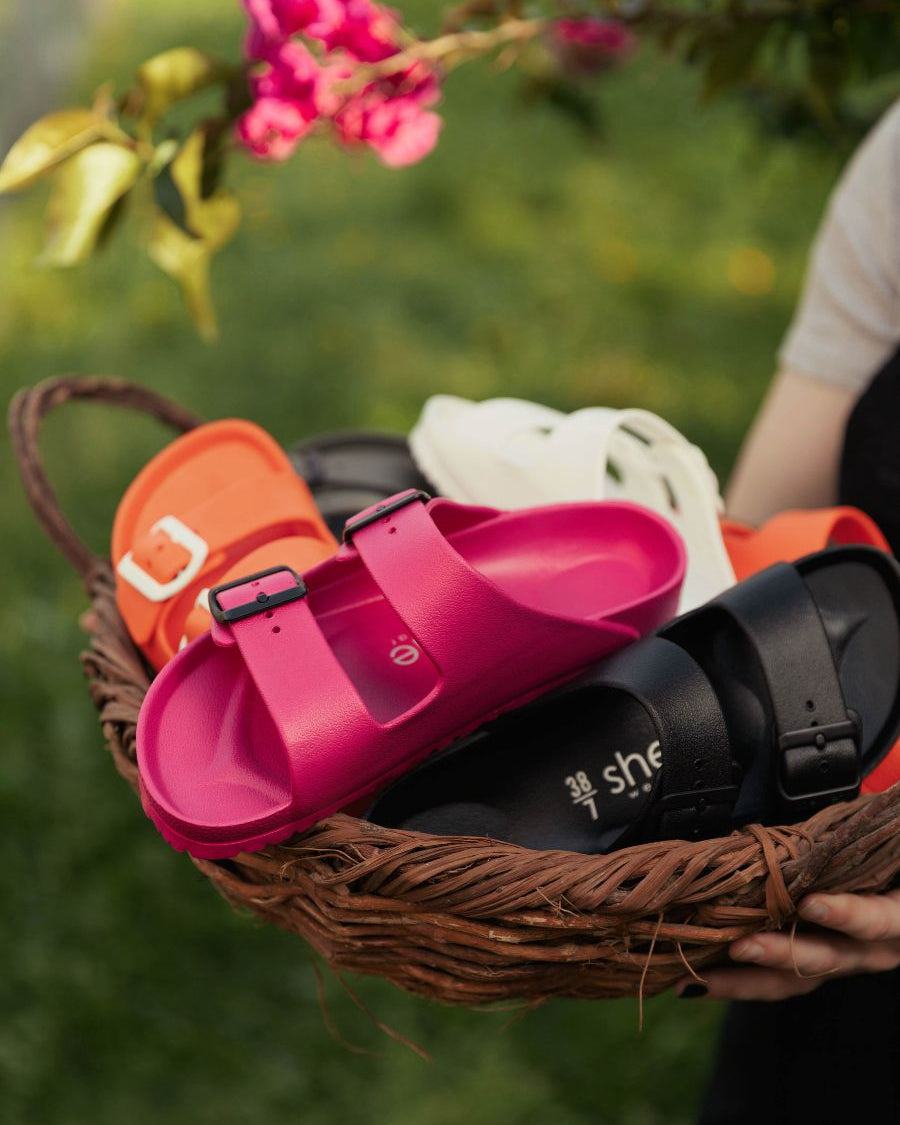 she wear slides in a basket with flower