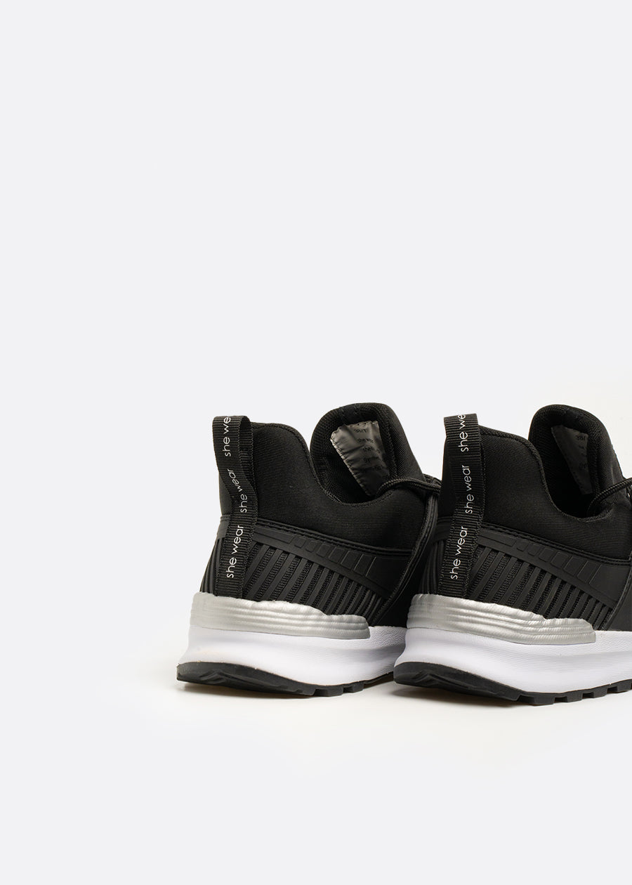 heel view of pull on sneakers with finger loop for easy application