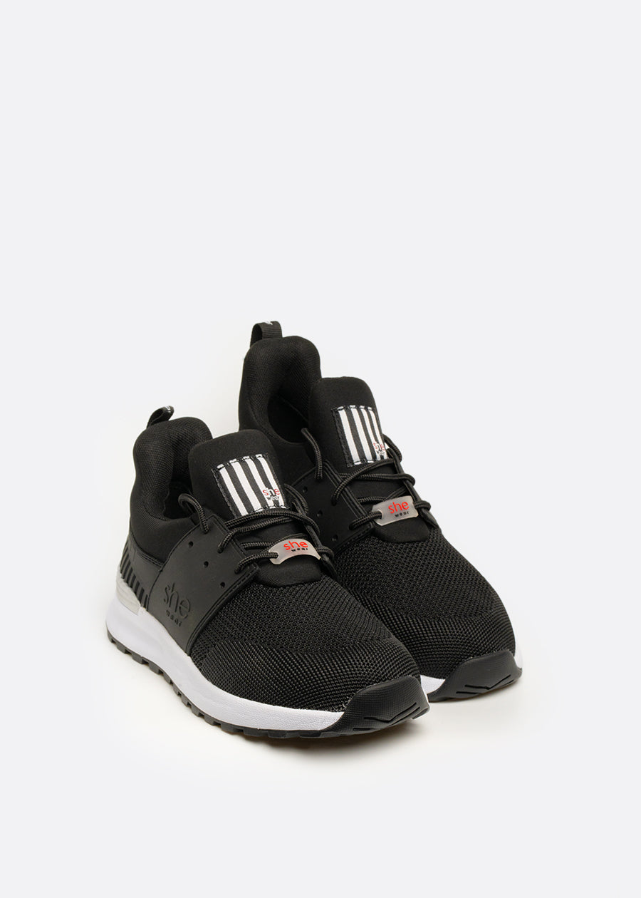 pair of black pull-on walking sneakers made from light weight mesh material
