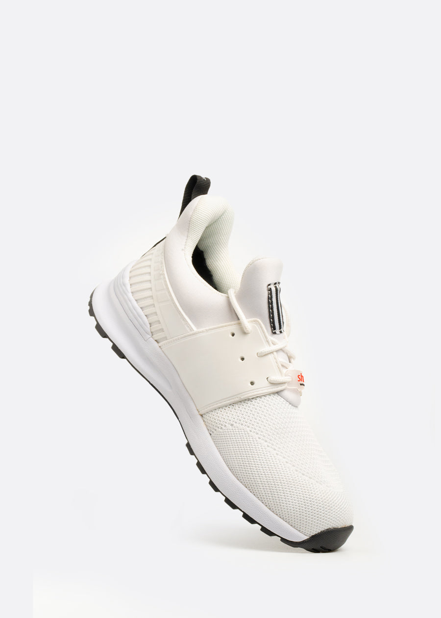 Breathable white vegan athleisure shoe on 45 degree angle