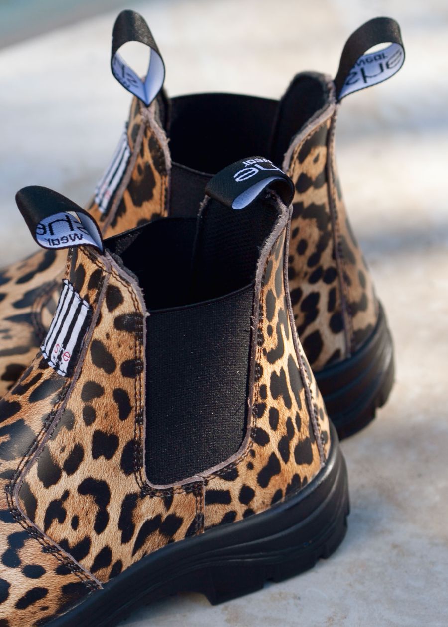 elastic side of a leopard print pull-on safety boot