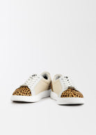 a pair of womens leopard print kicks
