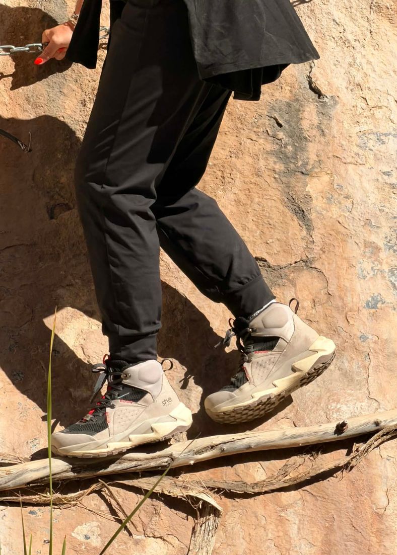 Rope walk in grey and black hiking shoes.