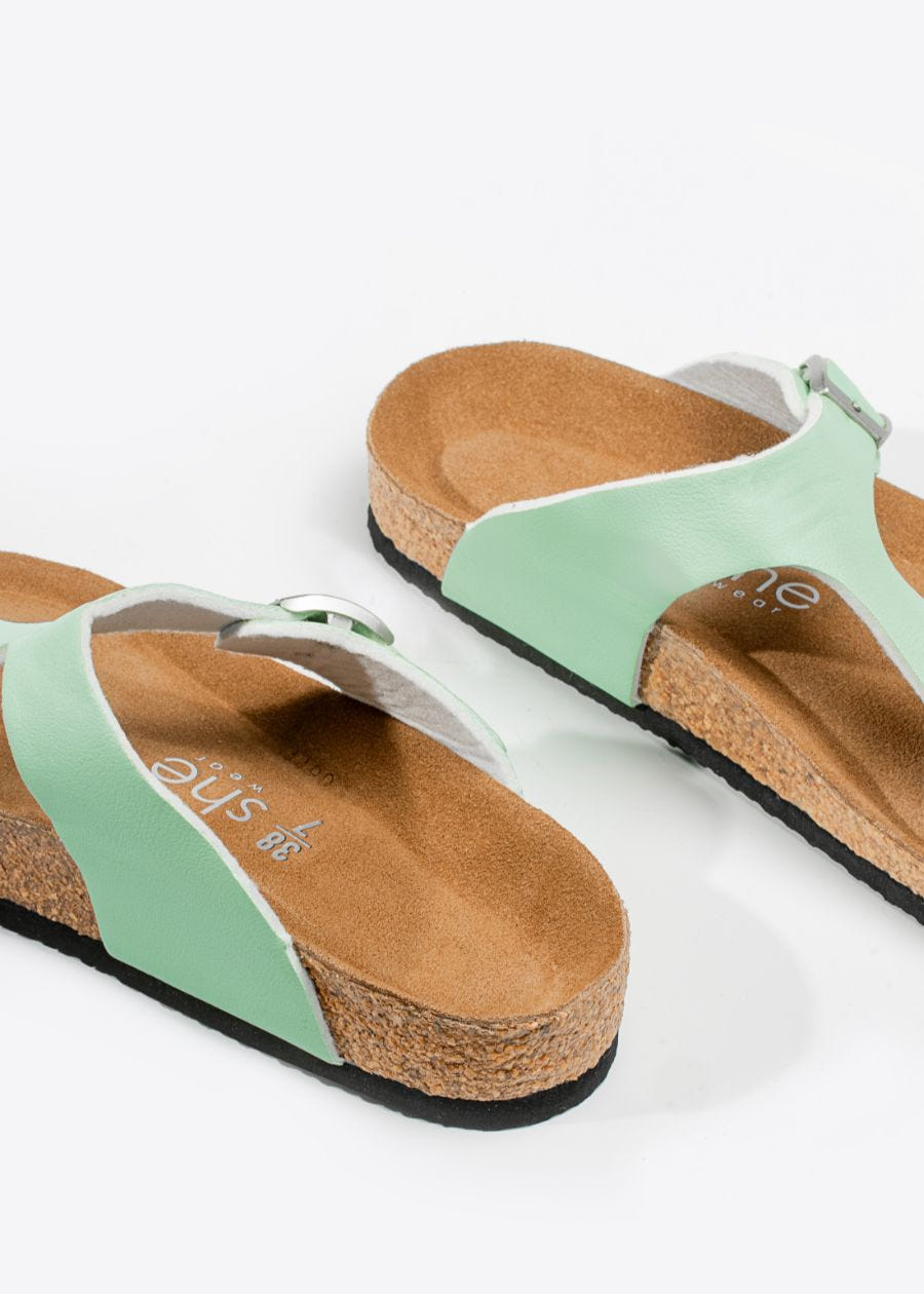 View of arch support and cradled heel support in women's Wander slides
