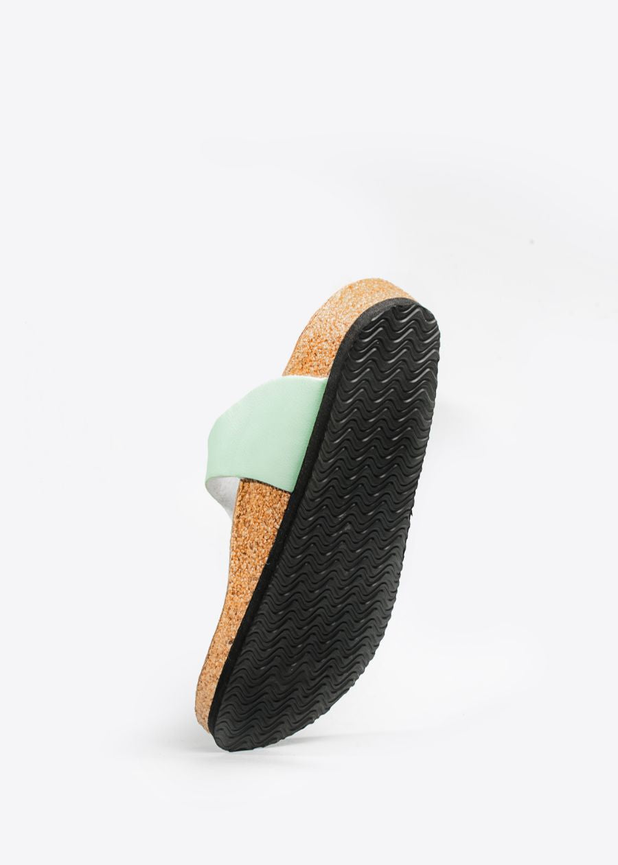 View of slip-resistant EVA outsole on women's Wander slide