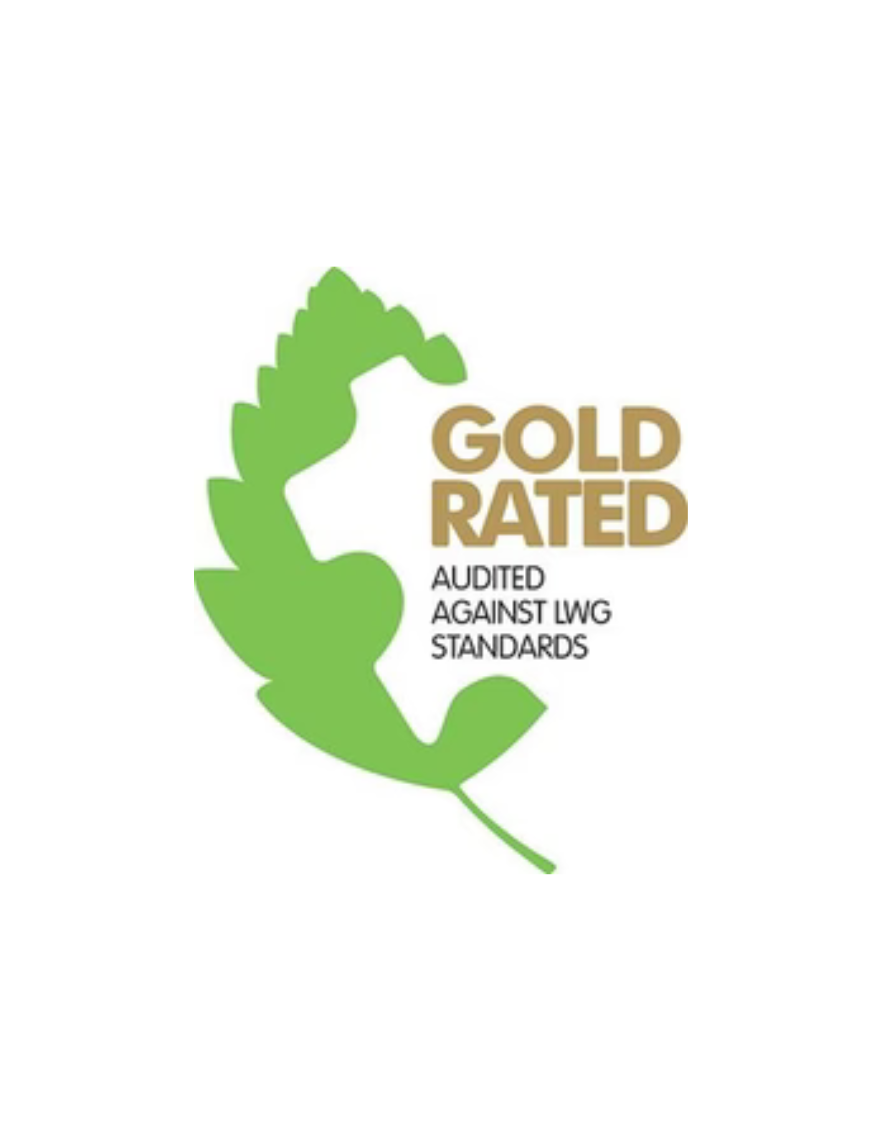Gold rated certification logo with green leaf on a white background