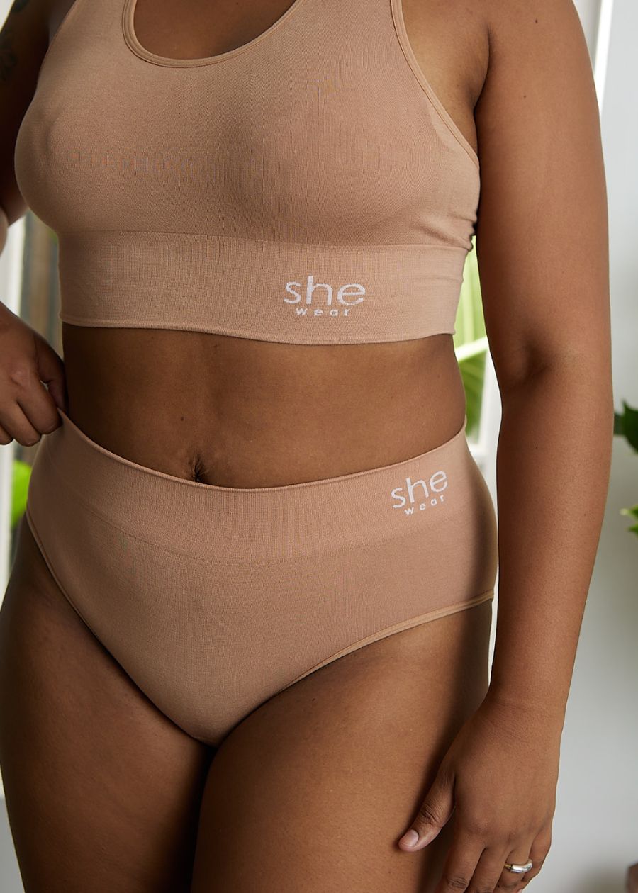 woman wearing viscose bamboo underwear set with she wear branding