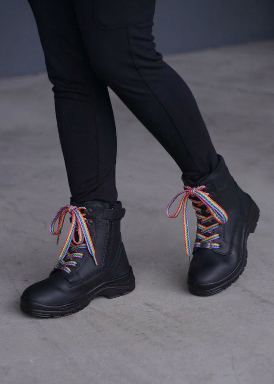 Rainbow boot laces on black zip-up boots. 