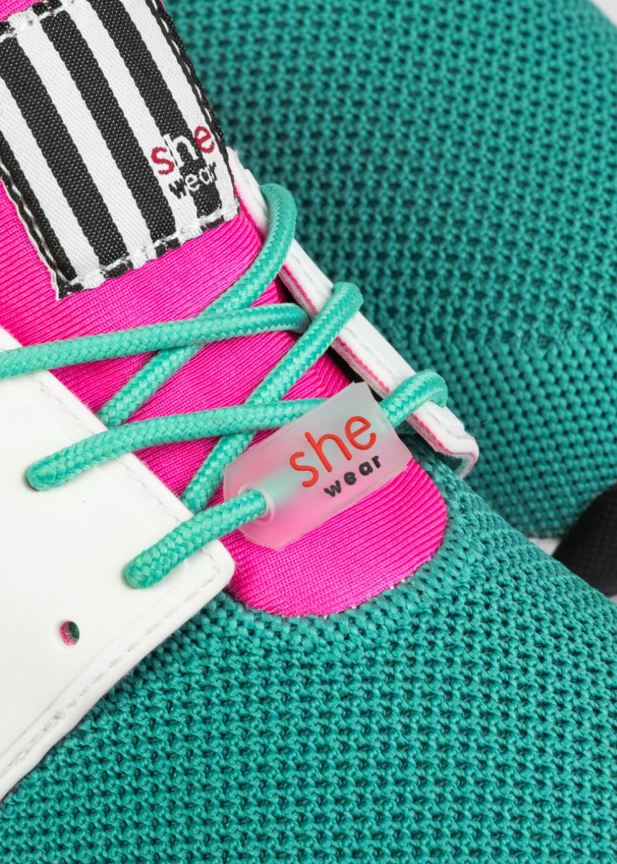 details of she wear active sneakers