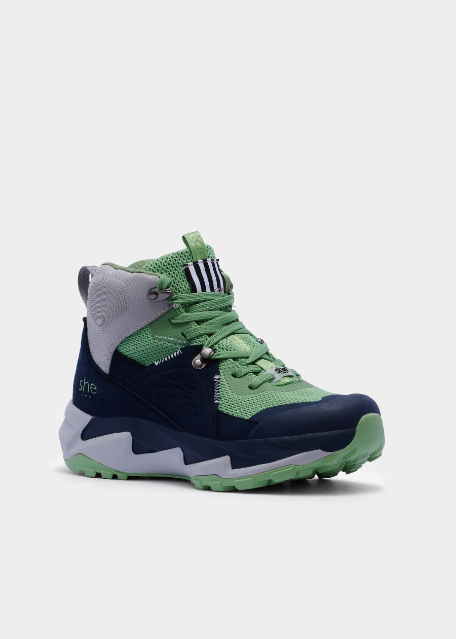 Vegan friendly, flyknit and microfibre hiking boot in navy and green. Featuring grey accents. 