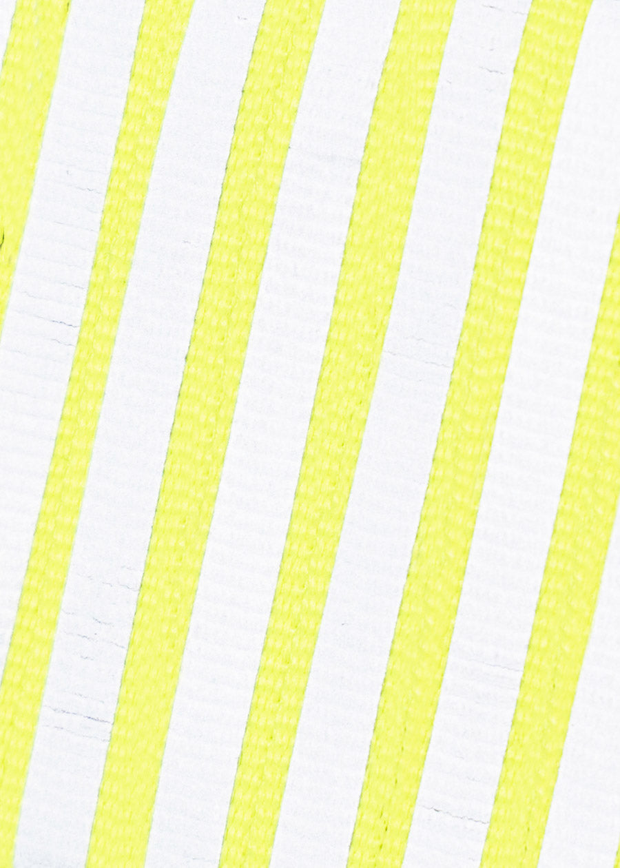 she wear reflective boot laces yellow shoelace closeup